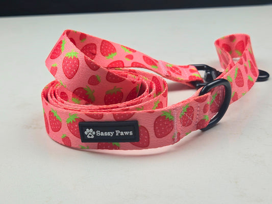 Pink, red with little Strawberries Sassy Paws dog Lead or Leash. Black finishings