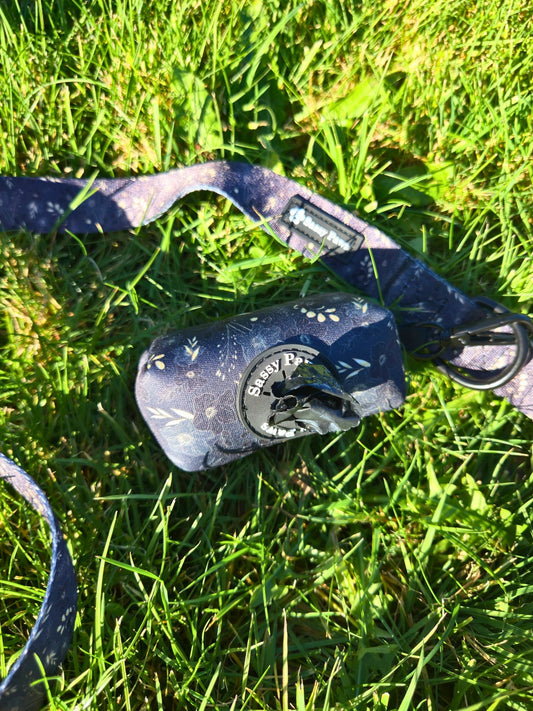 Black and gold Sassy Paws Waste Bag Holder with black clip and matching lead or leash Black finishings