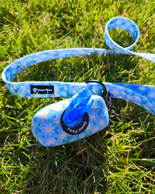 Blue with small white flowers Sassy Paws Waste Bag Holder with black clip and matching lead or leash Black finishings