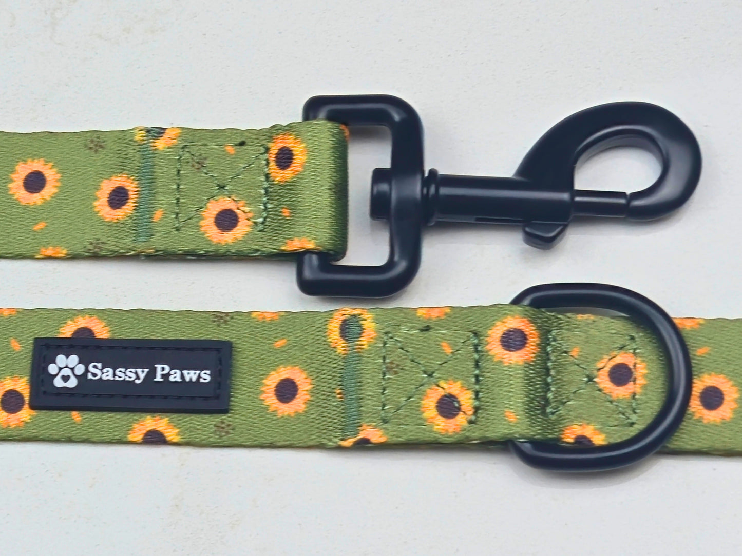 Green with little yellow sunflowers Sassy Paws dog Lead or Leash. Black finishings