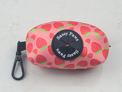 Pink, red with little strawberries Sassy Paws Waste Bag Holder with black clip